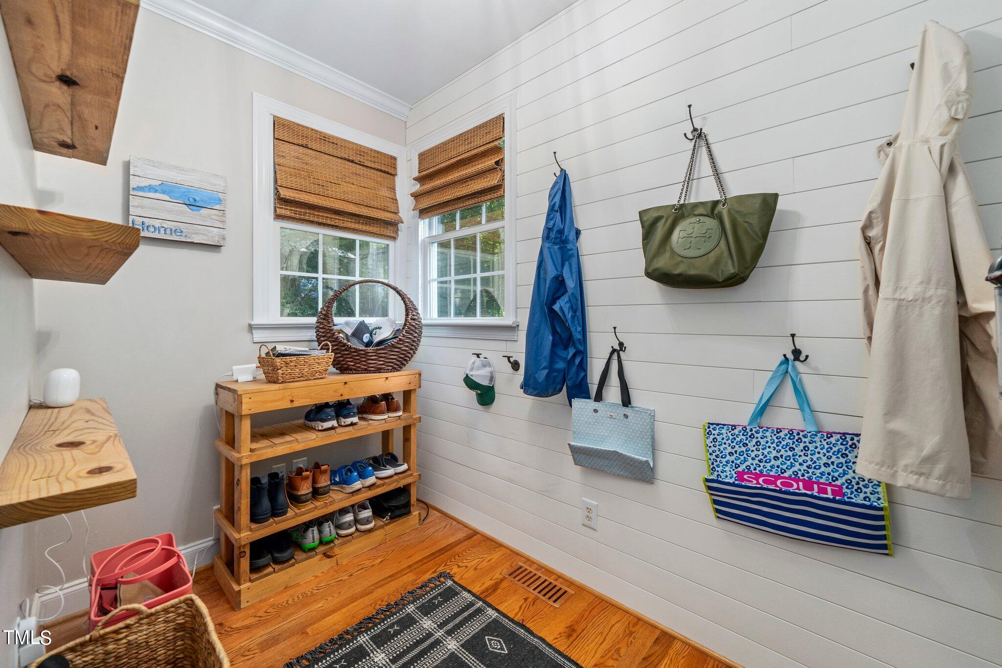 109 Chilcott Lane Apex, NC 27502 - Photo 18 of 34 a bedroom with furniture and a window