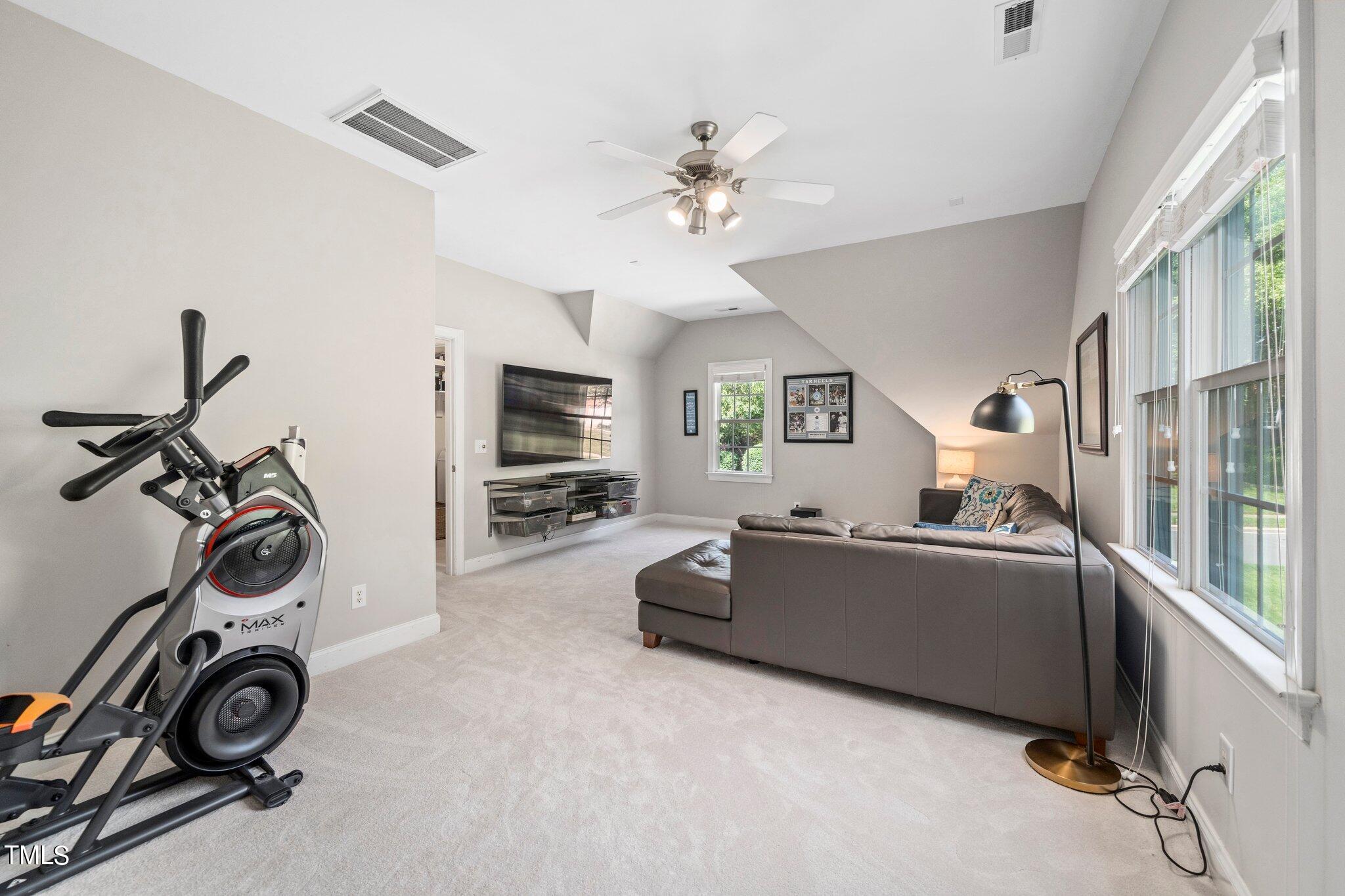 109 Chilcott Lane Apex, NC 27502 - Photo 28 of 34 a view of a livingroom with furniture and a window
