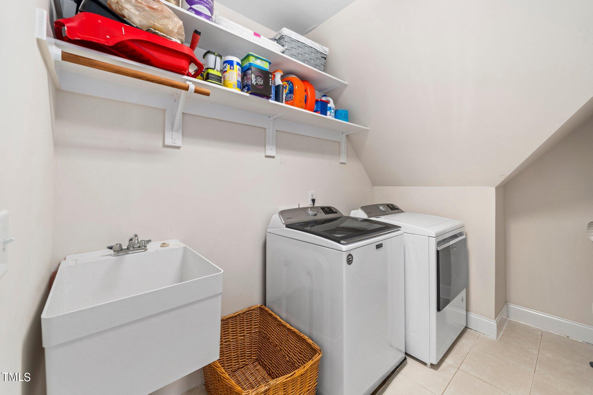109 Chilcott Lane Apex, NC 27502 - Photo 29 of 34 a utility room with dryer and washer