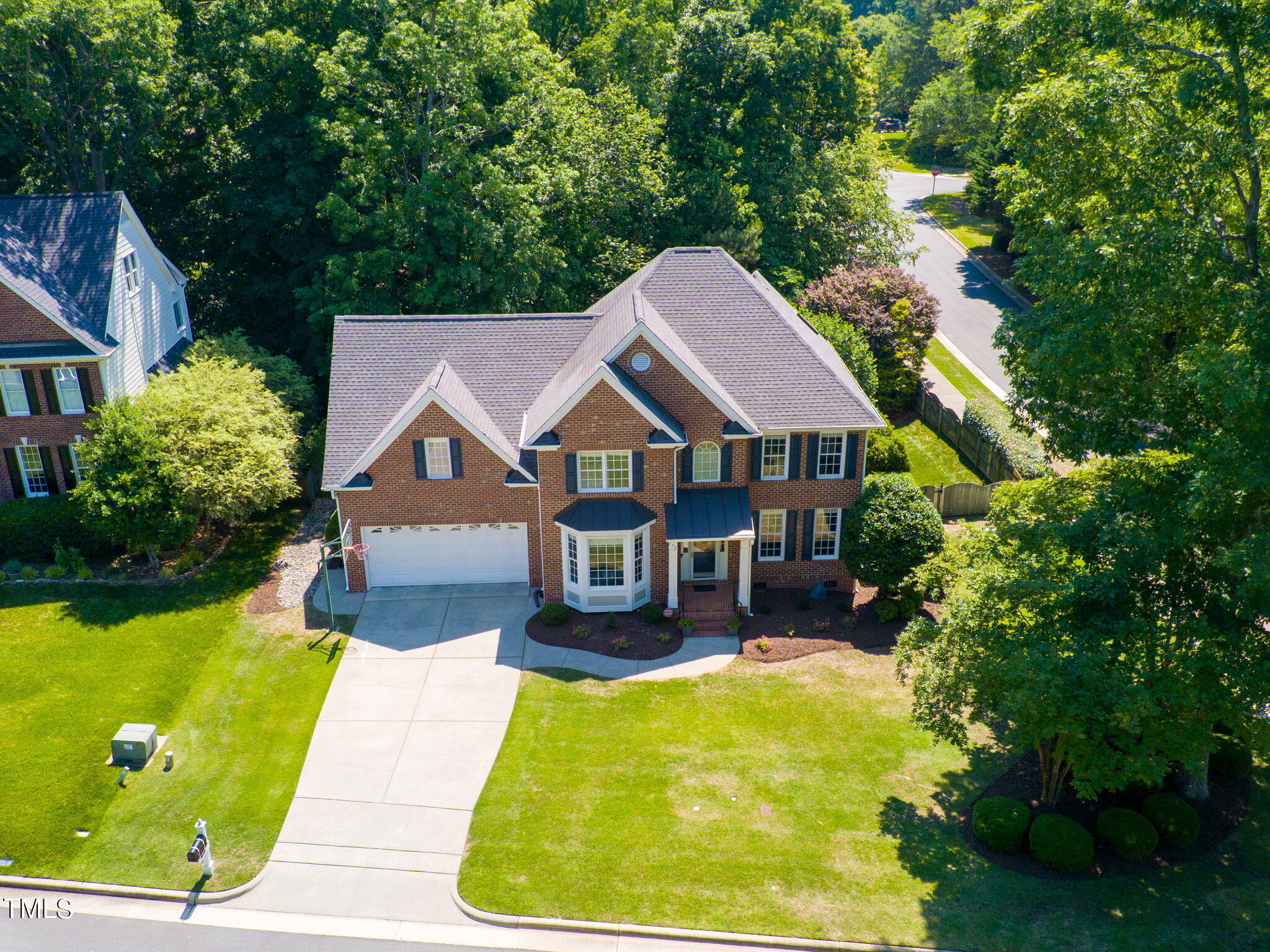 109 Chilcott Lane Apex, NC 27502 - Photo 34 of 34 a aerial view of a house with swimming pool and garden