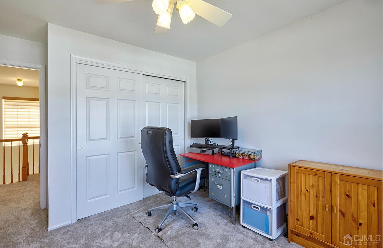 26 Glacier Drive Howell, NJ 07731 - Photo 26 of 31 a view of a workspace with furniture and a window