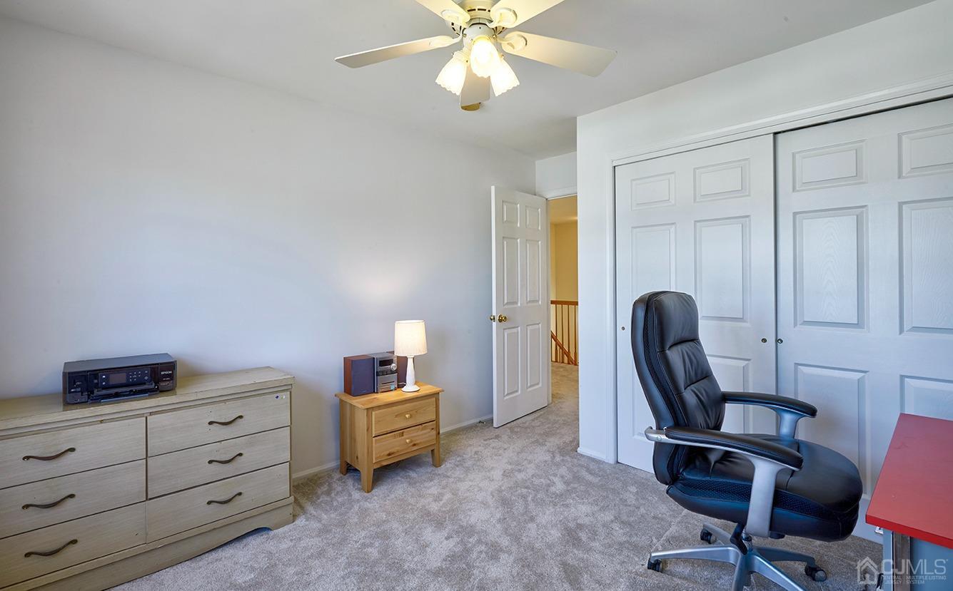 26 Glacier Drive Howell, NJ 07731 - Photo 27 of 31 a view of a workspace with furniture and a window