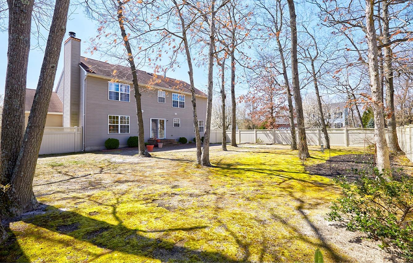 26 Glacier Drive Howell, NJ 07731 - Photo 31 of 31 a swimming pool with trees in front of it