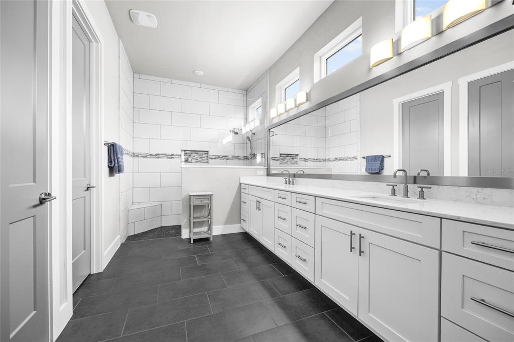 11949 Southwest 33 Lane Gainesville, FL 32608 - Photo 20 of 43 a kitchen with sink cabinets and window