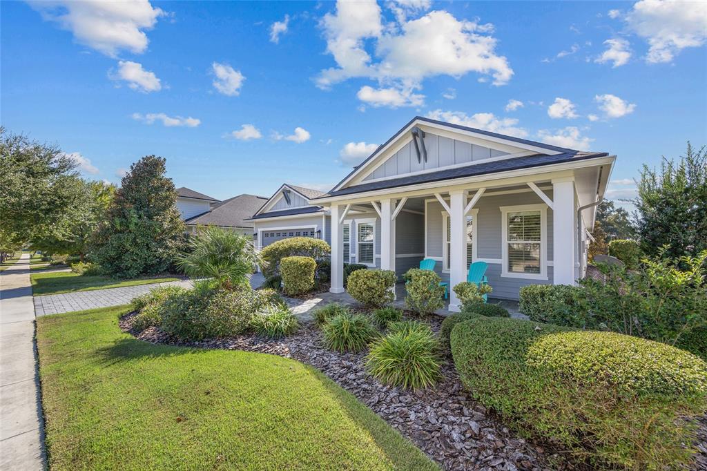 11949 Southwest 33 Lane Gainesville, FL 32608 - Photo 3 of 43 a front view of house with yard and green space