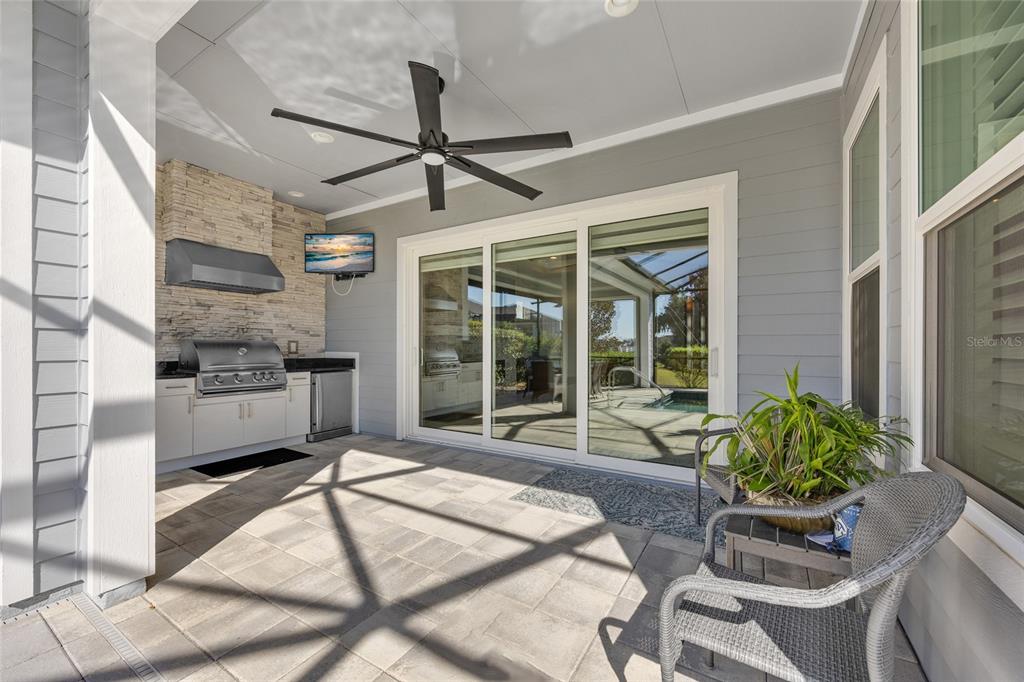 11949 Southwest 33 Lane Gainesville, FL 32608 - Photo 31 of 43 a living room filled with furniture and a potted plant