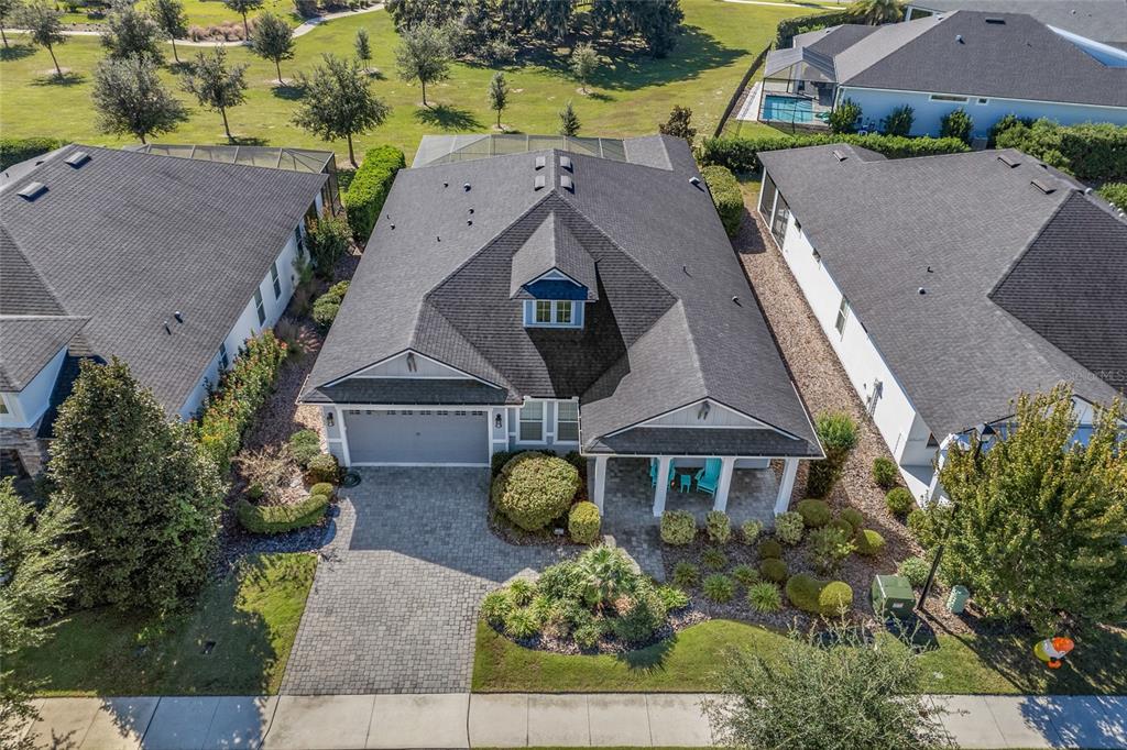 11949 Southwest 33 Lane Gainesville, FL 32608 - Photo 4 of 43 an aerial view of a house with a yard and large tree