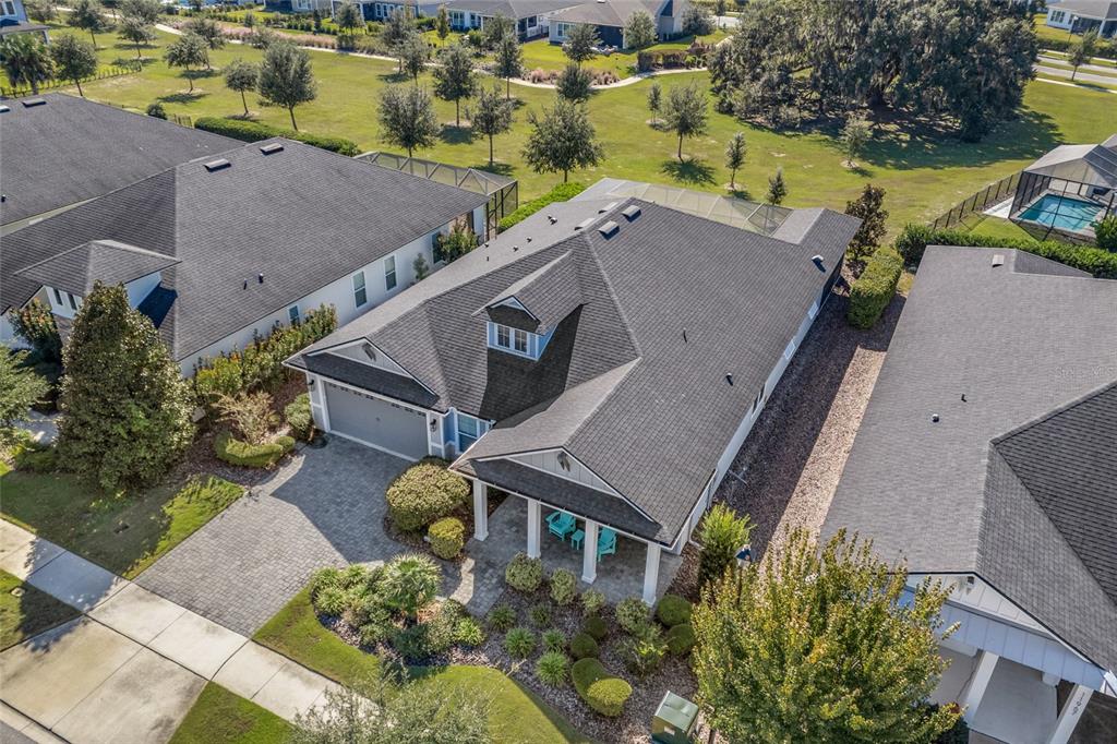 11949 Southwest 33 Lane Gainesville, FL 32608 - Photo 5 of 43 an aerial view of a house with a swimming pool
