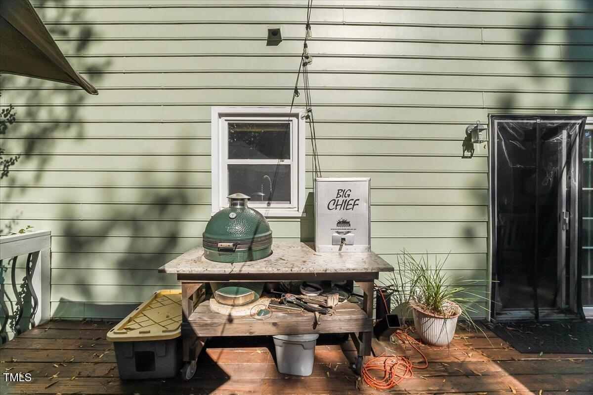 9813 Rockledge Drive Raleigh, NC 27617 - Photo 29 of 52 a backyard of a house with seating space