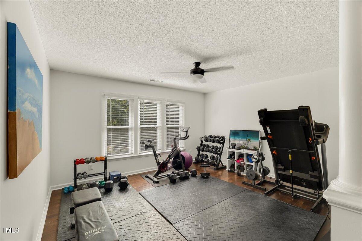 9813 Rockledge Drive Raleigh, NC 27617 - Photo 37 of 52 a view of a room with gym equipment