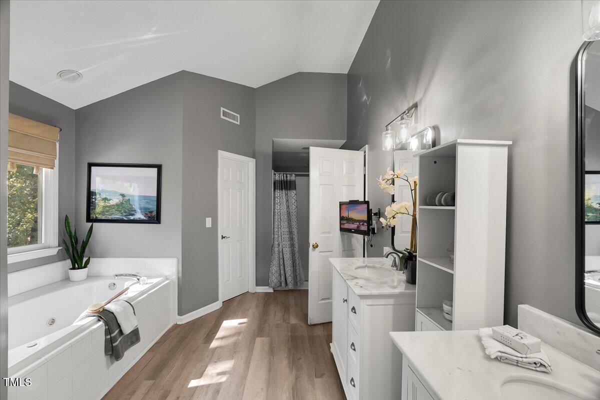 9813 Rockledge Drive Raleigh, NC 27617 - Photo 44 of 52 a kitchen with a sink stove and refrigerator