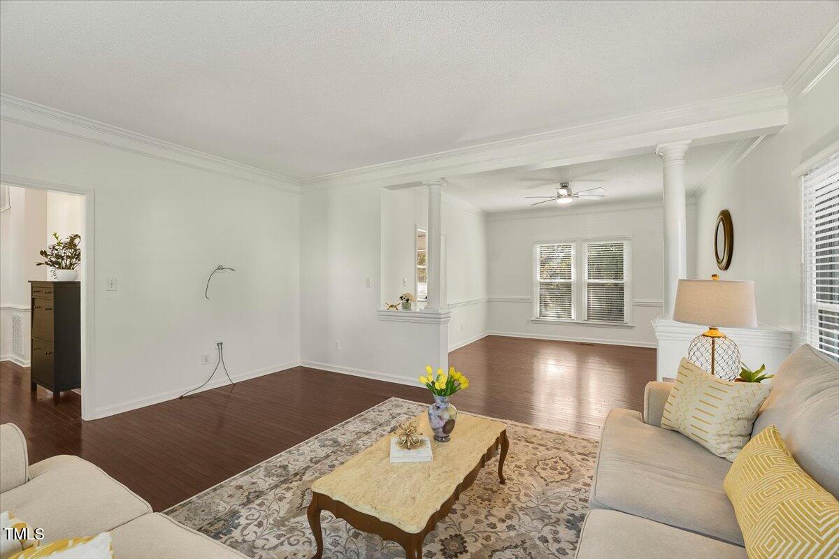9813 Rockledge Drive Raleigh, NC 27617 - Photo 6 of 52 a living room with furniture and window