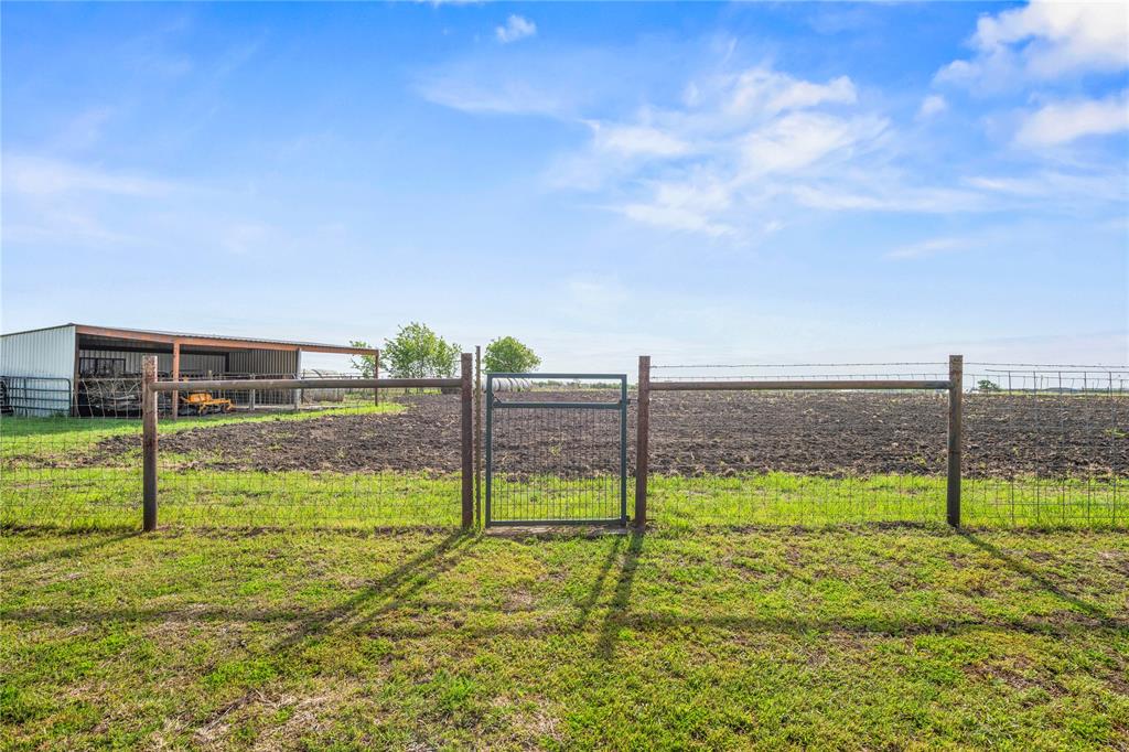 314 Jackson Heights Lorena, TX 76655 - Photo 7 of 40 Barn and Plowed Hay field