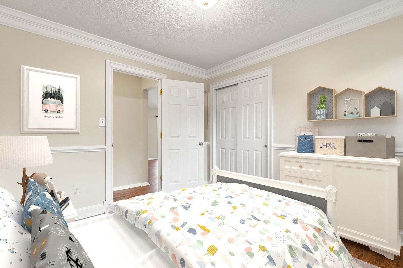 6505 Farley Street Springfield, VA 22152 - Photo 18 of 30 a bedroom with a bed and a dresser in it