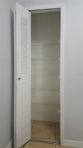 a bathroom with a glass door