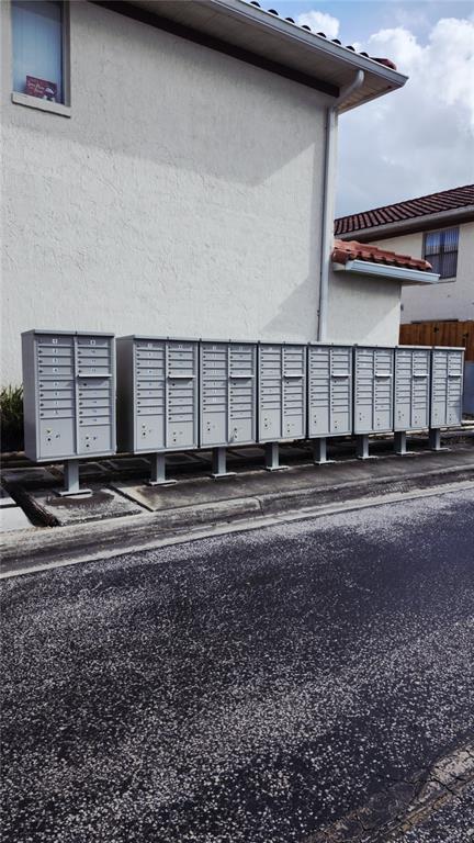 1737 Shady Ridge Court, Unit 231 Orlando, FL 32807 - Photo 30 of 30 a view of a house with a back yard