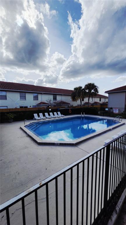 1737 Shady Ridge Court, Unit 231 Orlando, FL 32807 - Photo 5 of 30 a view of a balcony with an outdoor space
