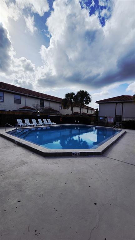 1737 Shady Ridge Court, Unit 231 Orlando, FL 32807 - Photo 6 of 30 a view of a terrace with sky view