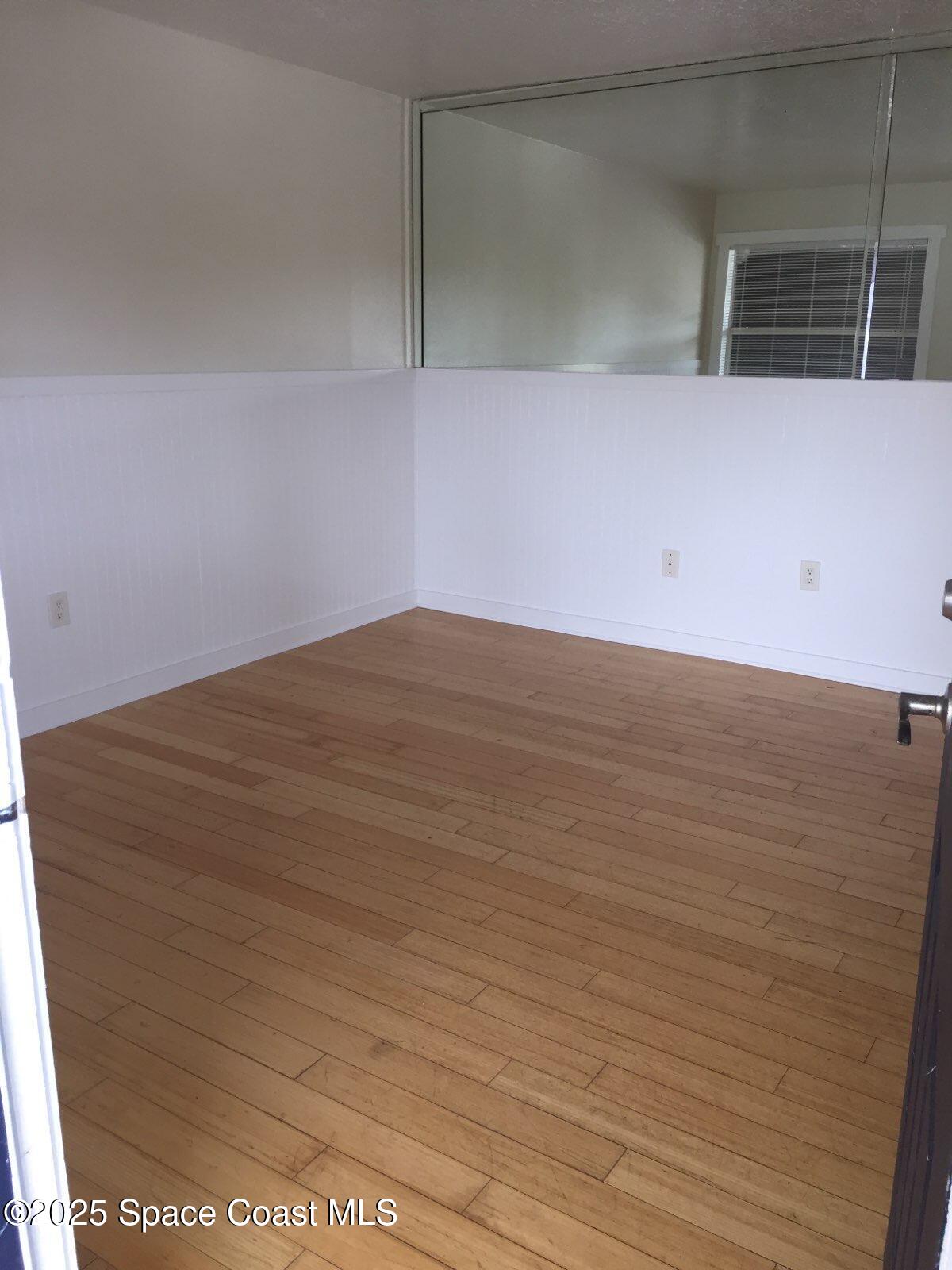 307 Adams Avenue, Unit 14 Cape Canaveral, FL 32920 - Photo 3 of 9 a view of empty room