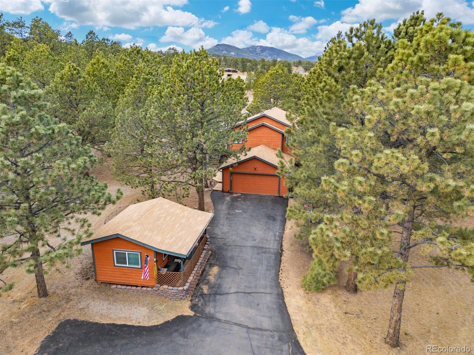 1768 Bluebird Drive Bailey, CO 80421 - Photo 2 of 50 a aerial view of a house with a yard
