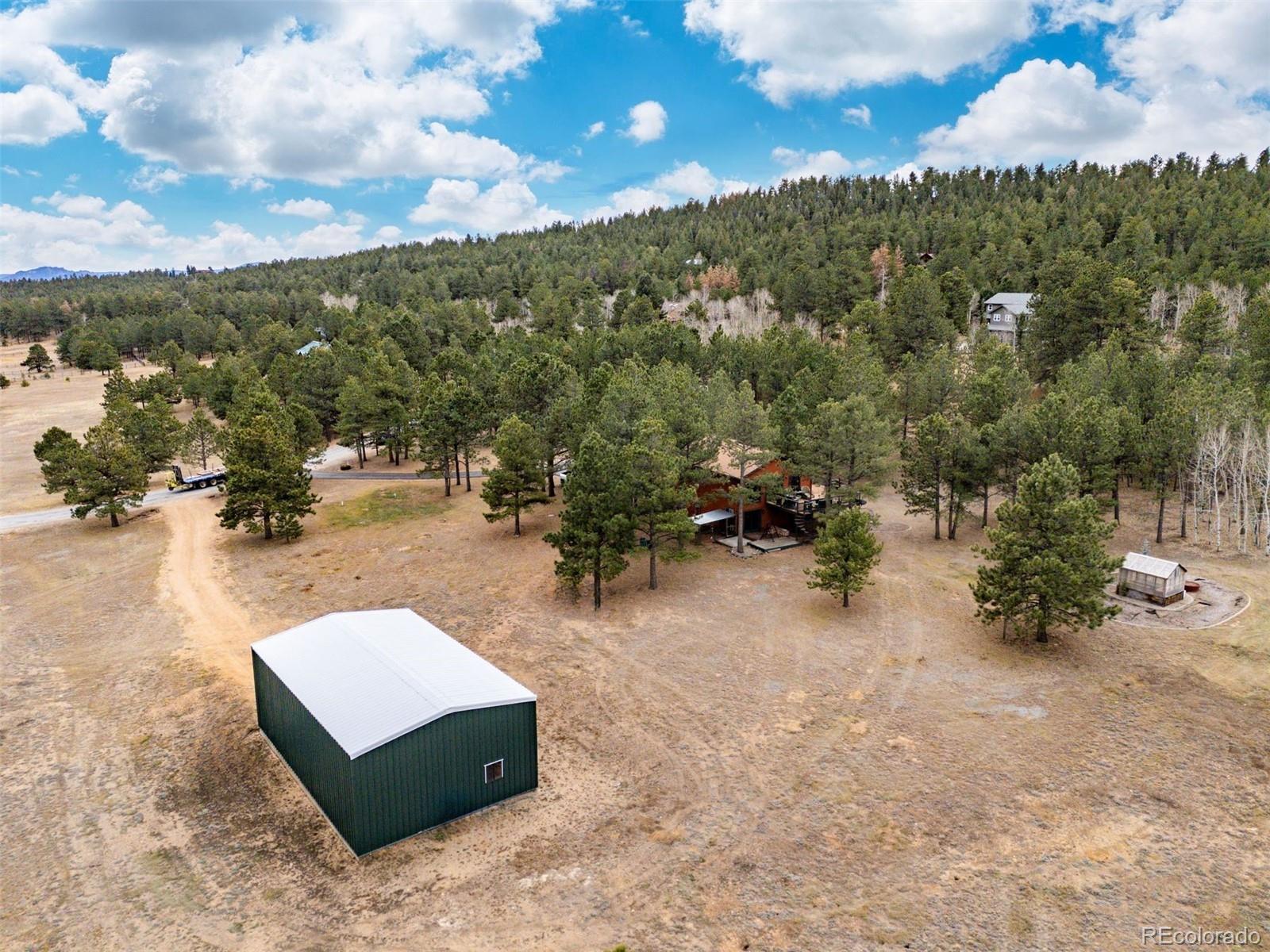 1768 Bluebird Drive Bailey, CO 80421 - Photo 39 of 50 an aerial view of a house having yard