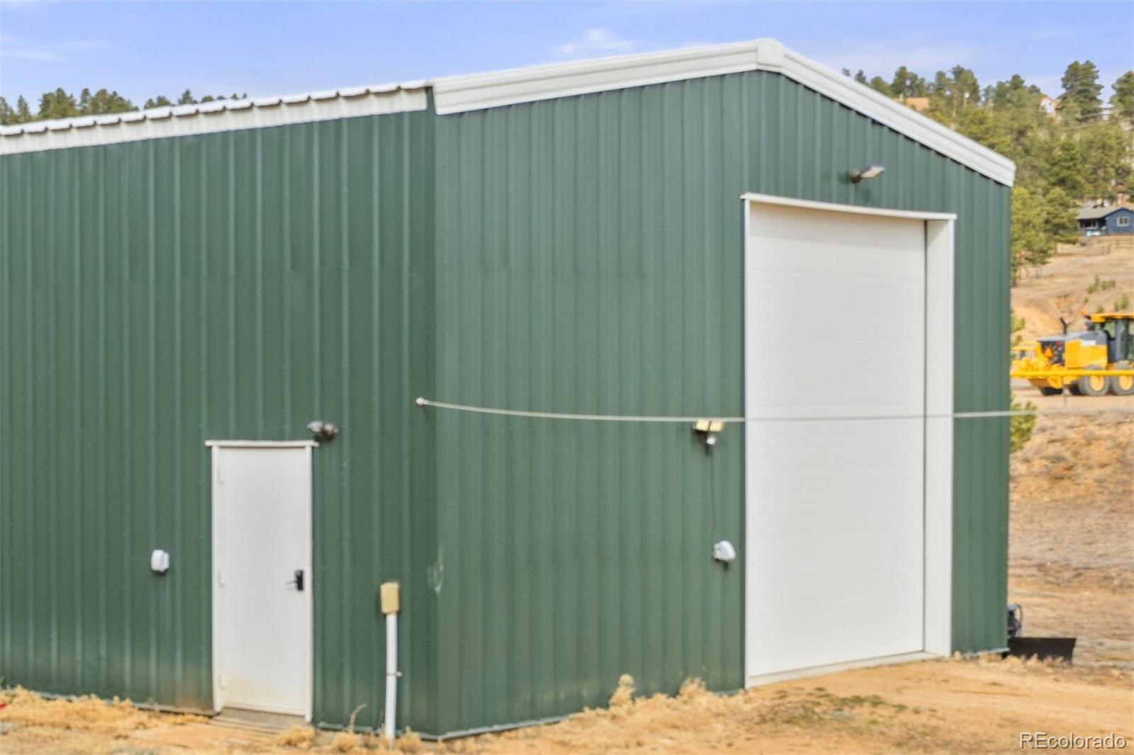 1768 Bluebird Drive Bailey, CO 80421 - Photo 41 of 50 a house view with a backyard space