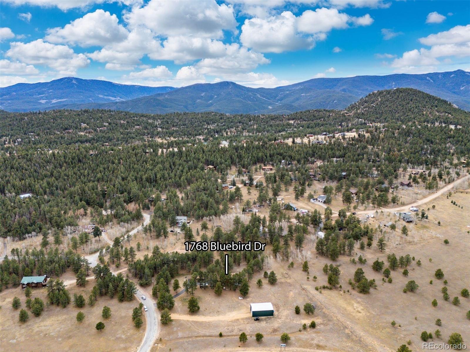 1768 Bluebird Drive Bailey, CO 80421 - Photo 45 of 50 a view of a sky from a city