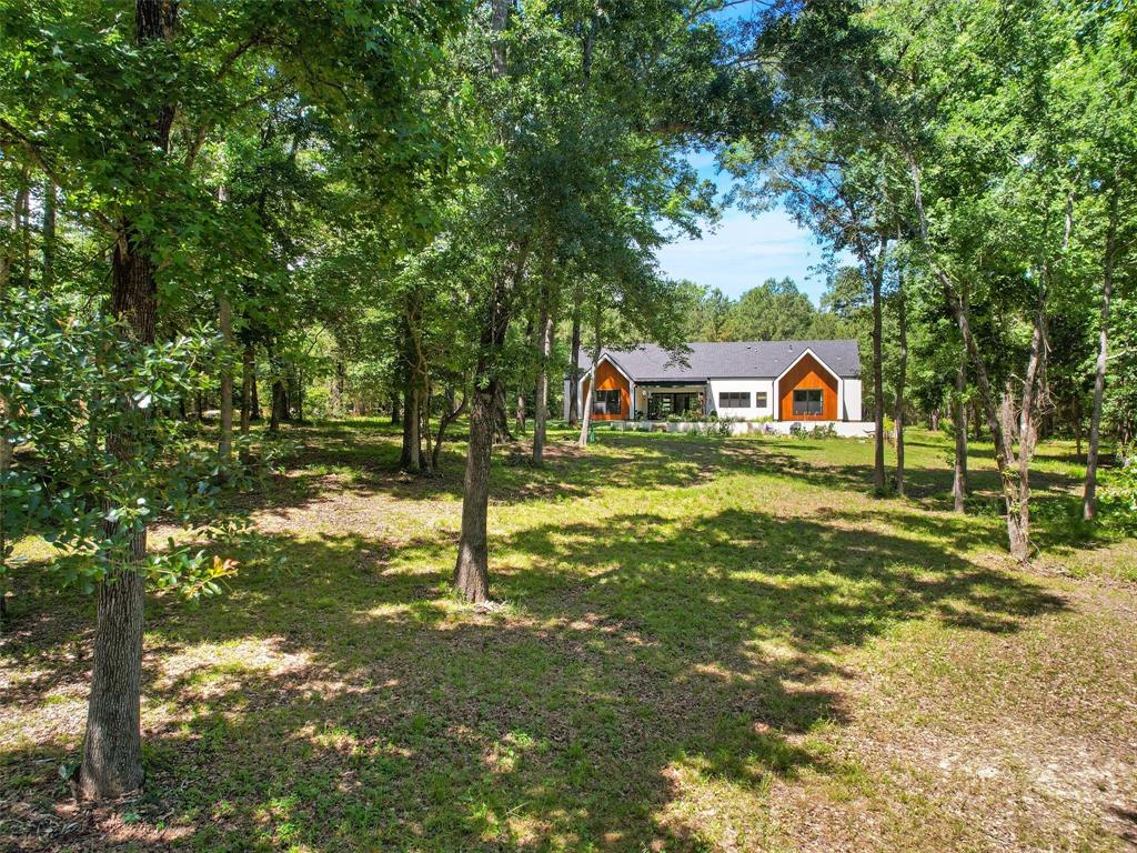800 John Dean Road Gilmer, TX 75644 - Photo 7 of 40 a view of an house with swimming pool