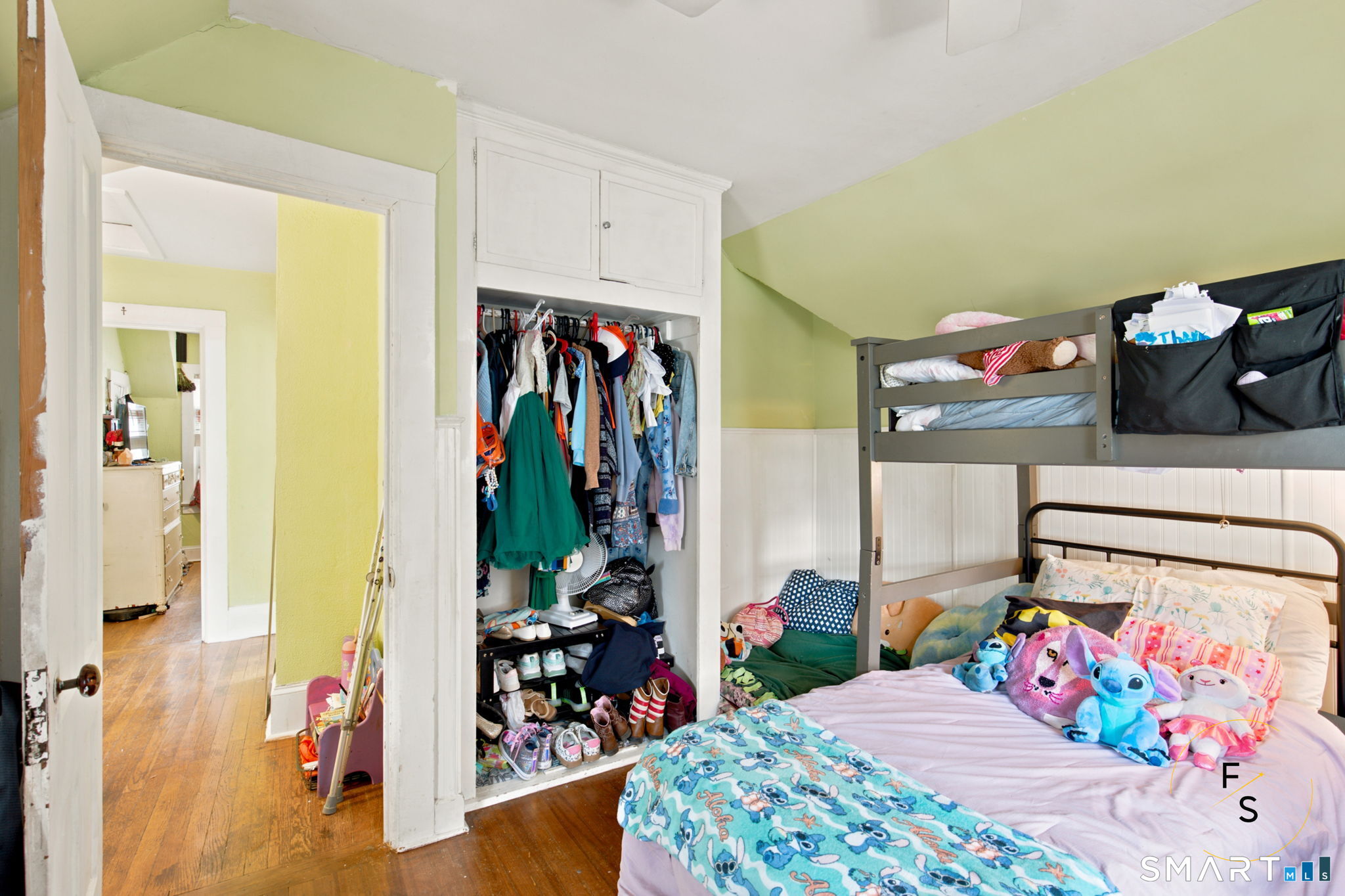 182 Broad Street Norwich, CT 06360 - Photo 26 of 30 a bedroom with a bed and a bed