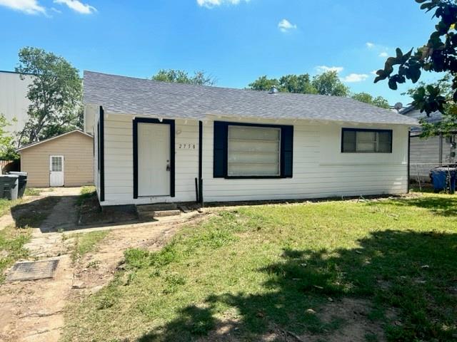 2758 Cedardale Road Dallas, TX 75241 - Photo 1 of 1 a front view of a house with a yard