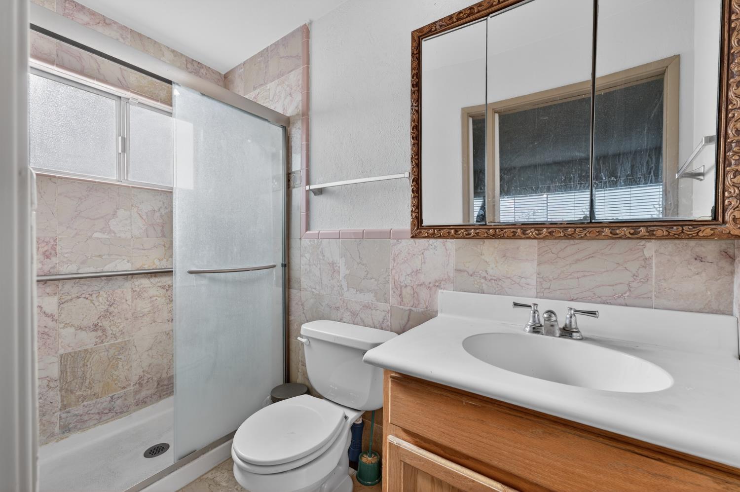 6500 Cookson Way Fair Oaks, CA 95628 - Photo 14 of 37 a bathroom with a sink toilet and shower