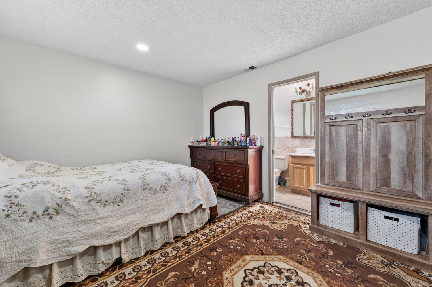 6500 Cookson Way Fair Oaks, CA 95628 - Photo 17 of 37 a bedroom with a bed next to a window with the dresser