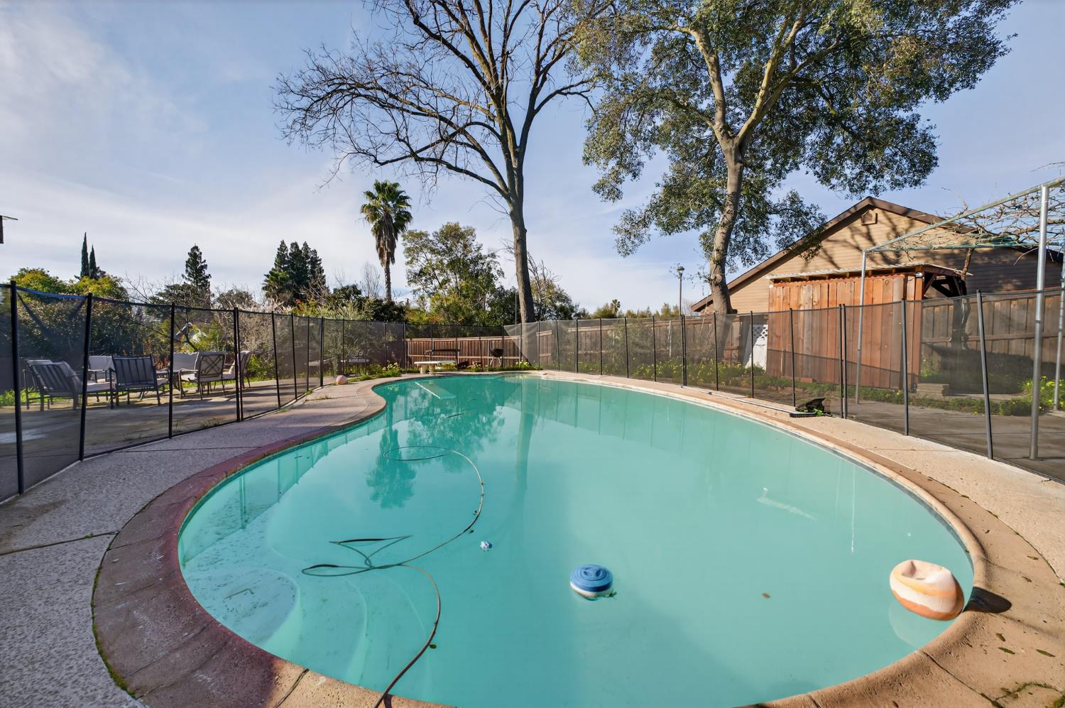 6500 Cookson Way Fair Oaks, CA 95628 - Photo 22 of 37 a view of a swimming pool with a patio