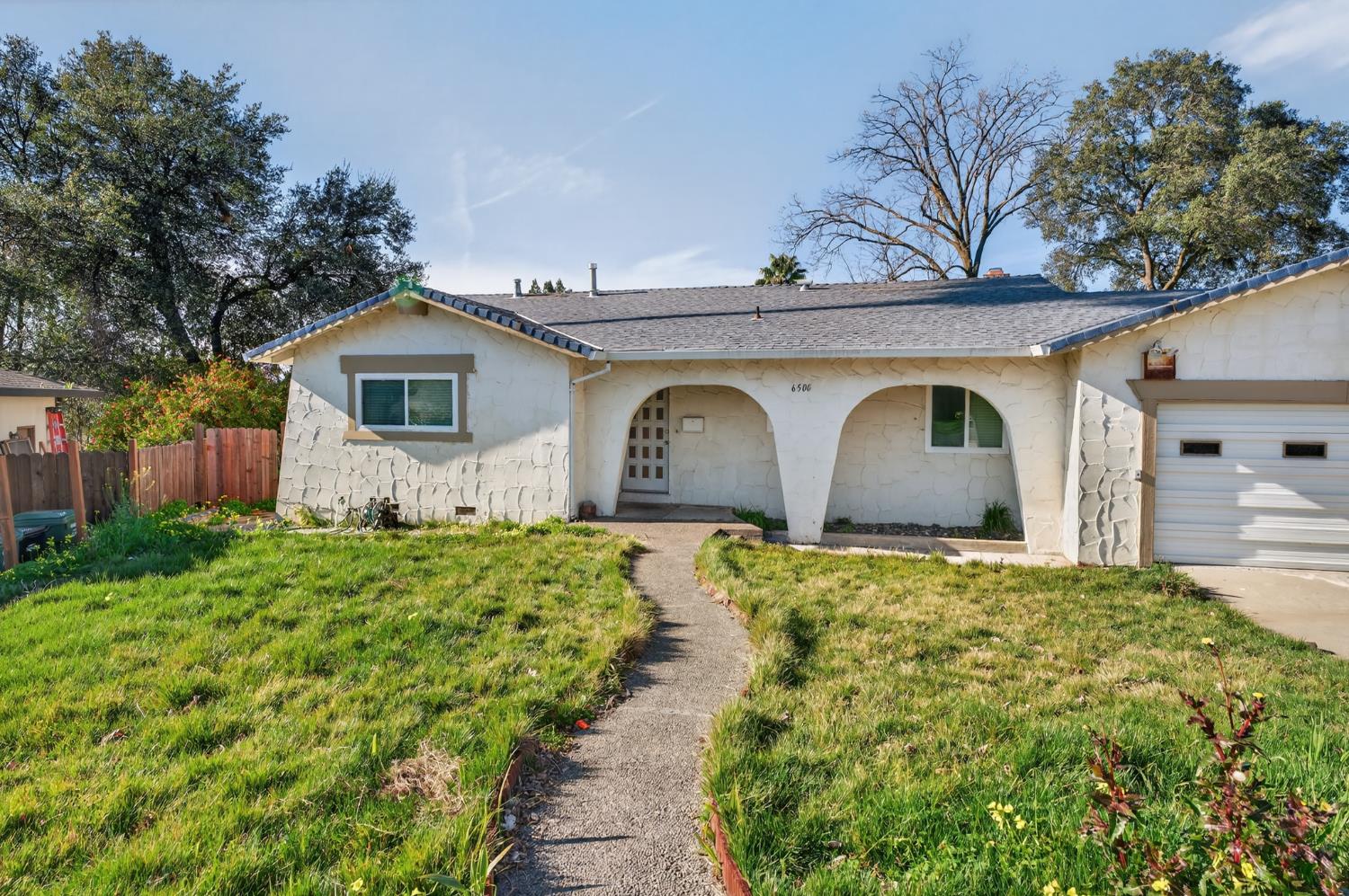6500 Cookson Way Fair Oaks, CA 95628 - Photo 37 of 37 a front view of house with yard and trees around