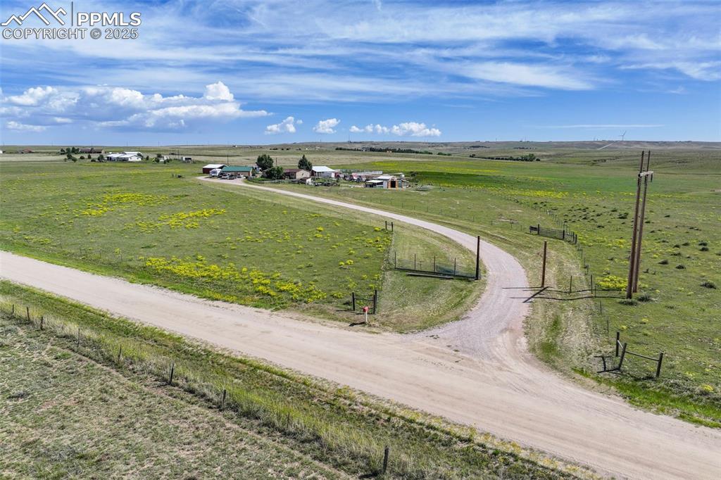 9235 Guthrie Road Calhan, CO 80808 - Photo 3 of 49 a view of a street with an ocean view