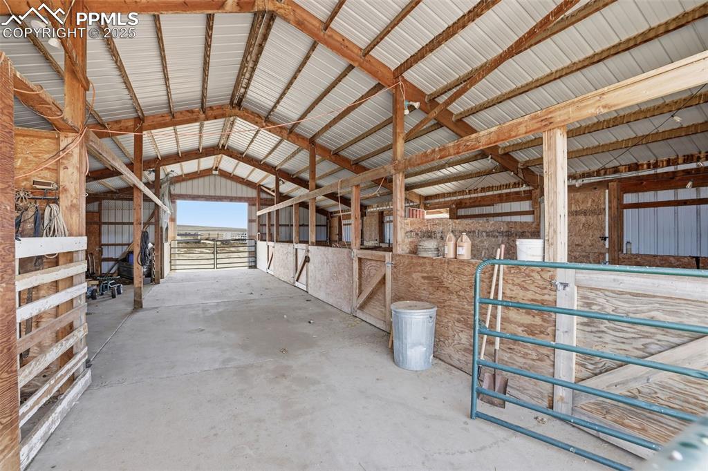 9235 Guthrie Road Calhan, CO 80808 - Photo 33 of 49 a view of a porch with a garage