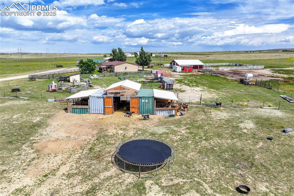 9235 Guthrie Road Calhan, CO 80808 - Photo 35 of 49 a aerial view of a house with a yard