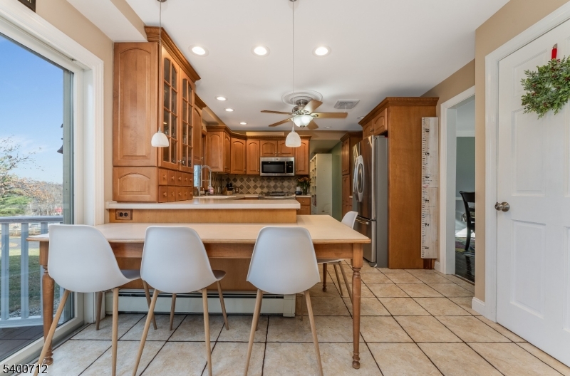 421 Adamic Hill Road Milford, NJ 08848 - Photo 14 of 45 a view of a dining room with furniture