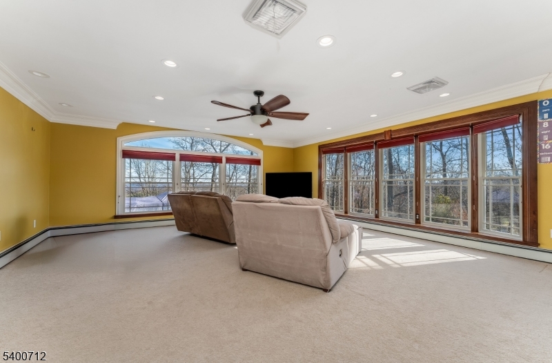 421 Adamic Hill Road Milford, NJ 08848 - Photo 20 of 45 a living room with furniture gym equipment and a large window