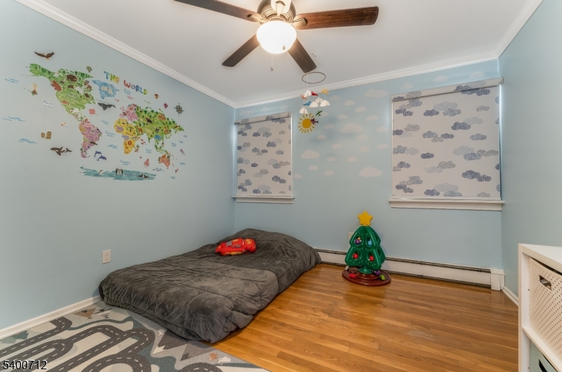 421 Adamic Hill Road Milford, NJ 08848 - Photo 28 of 45 a bedroom with a bed and a painting on the wall