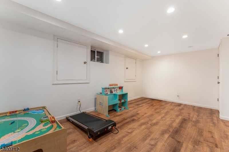 421 Adamic Hill Road Milford, NJ 08848 - Photo 33 of 45 a room with toys and wooden floor