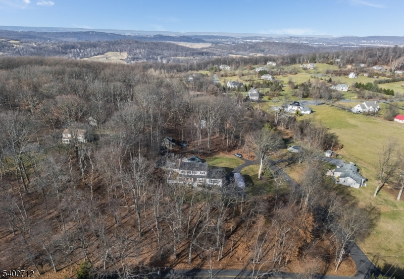421 Adamic Hill Road Milford, NJ 08848 - Photo 43 of 45 a view of a lake with a city