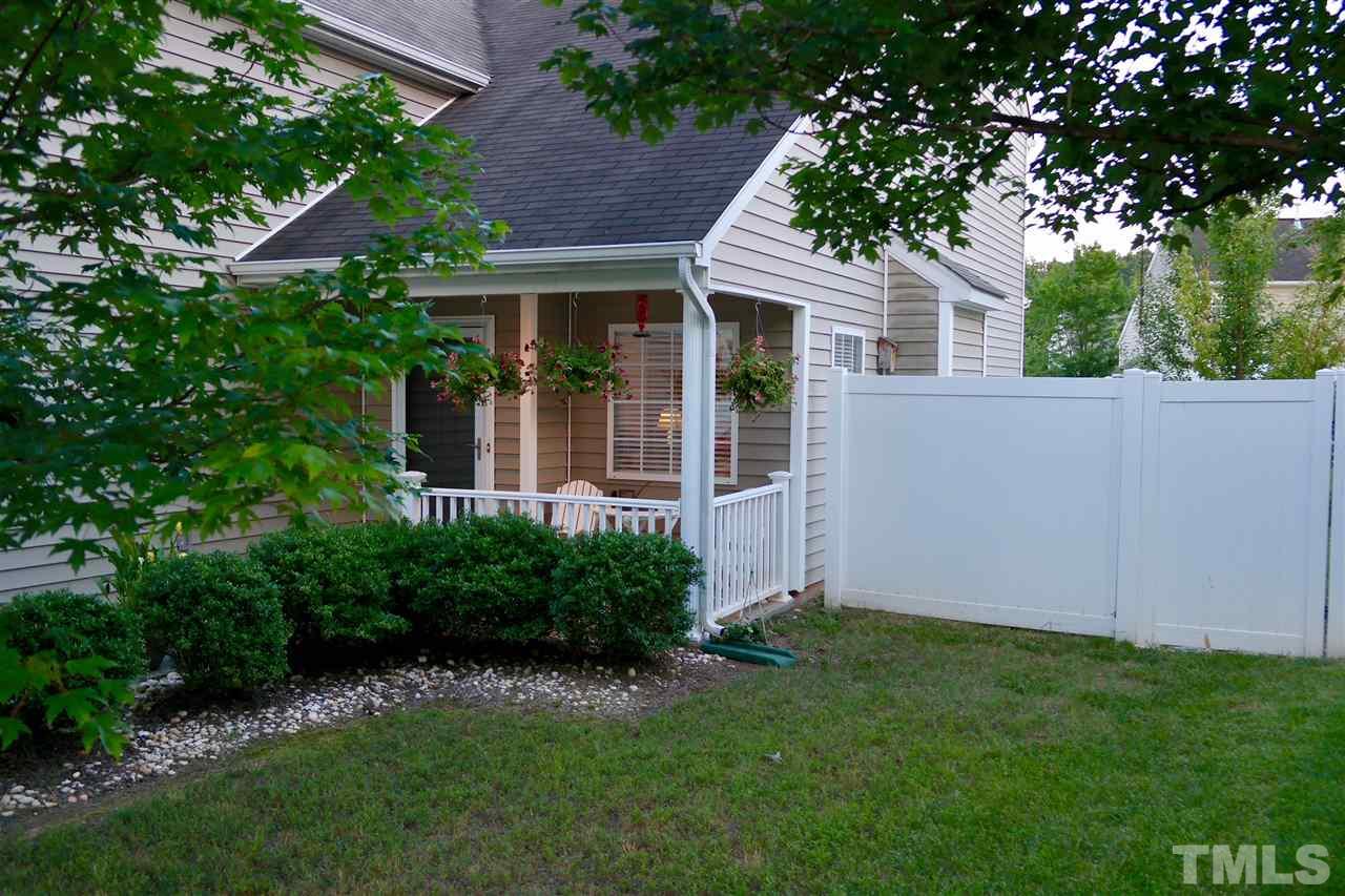 1012 Lombar Street Raleigh, NC 27610 - Photo 1 of 20 a view of an house with backyard space and garden