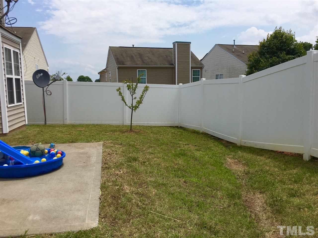 1012 Lombar Street Raleigh, NC 27610 - Photo 7 of 20 a view of an house with backyard space and garden