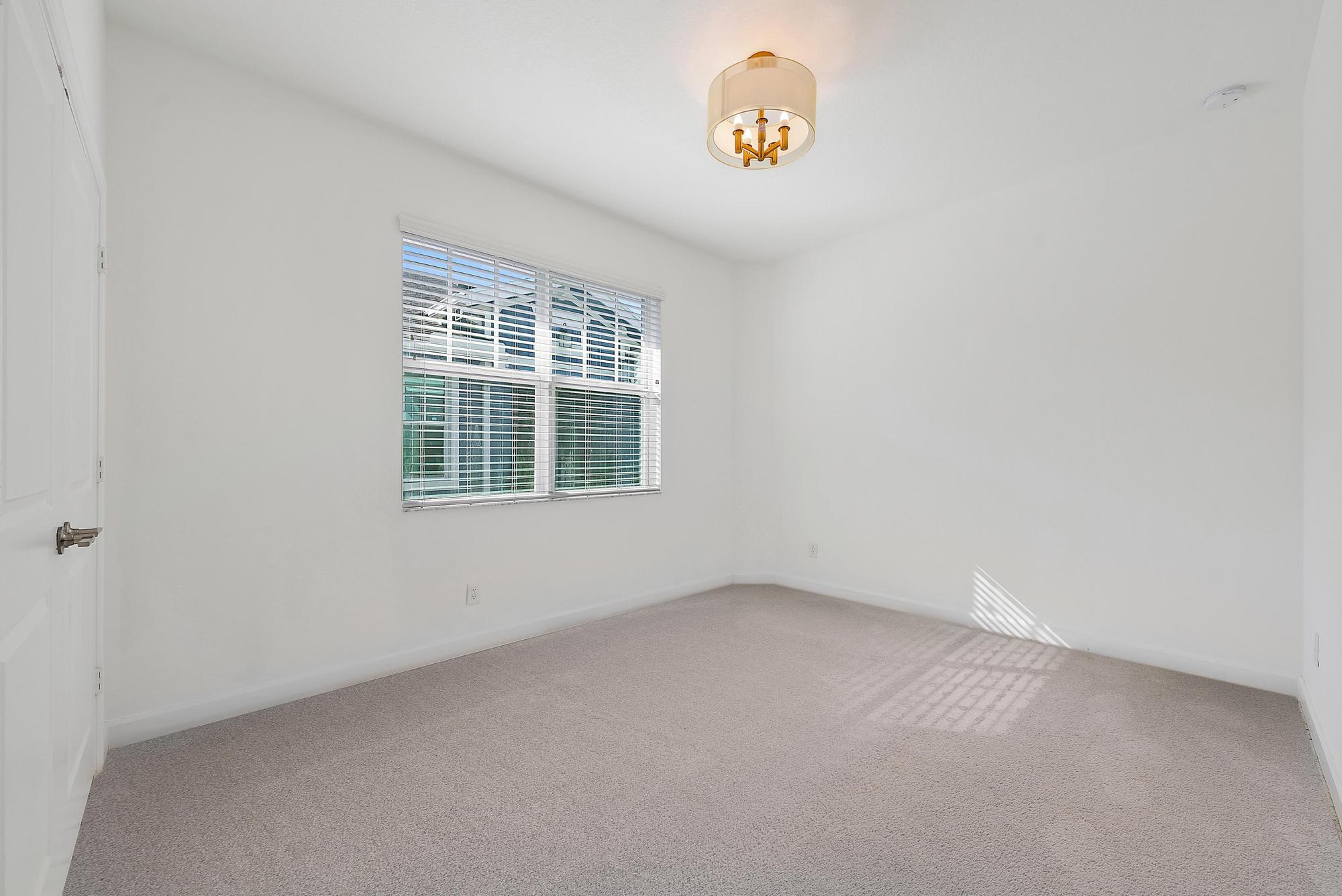 1283 Tangled Orch Trace Loxahatchee, FL 33470 - Photo 14 of 21 an empty room with a window