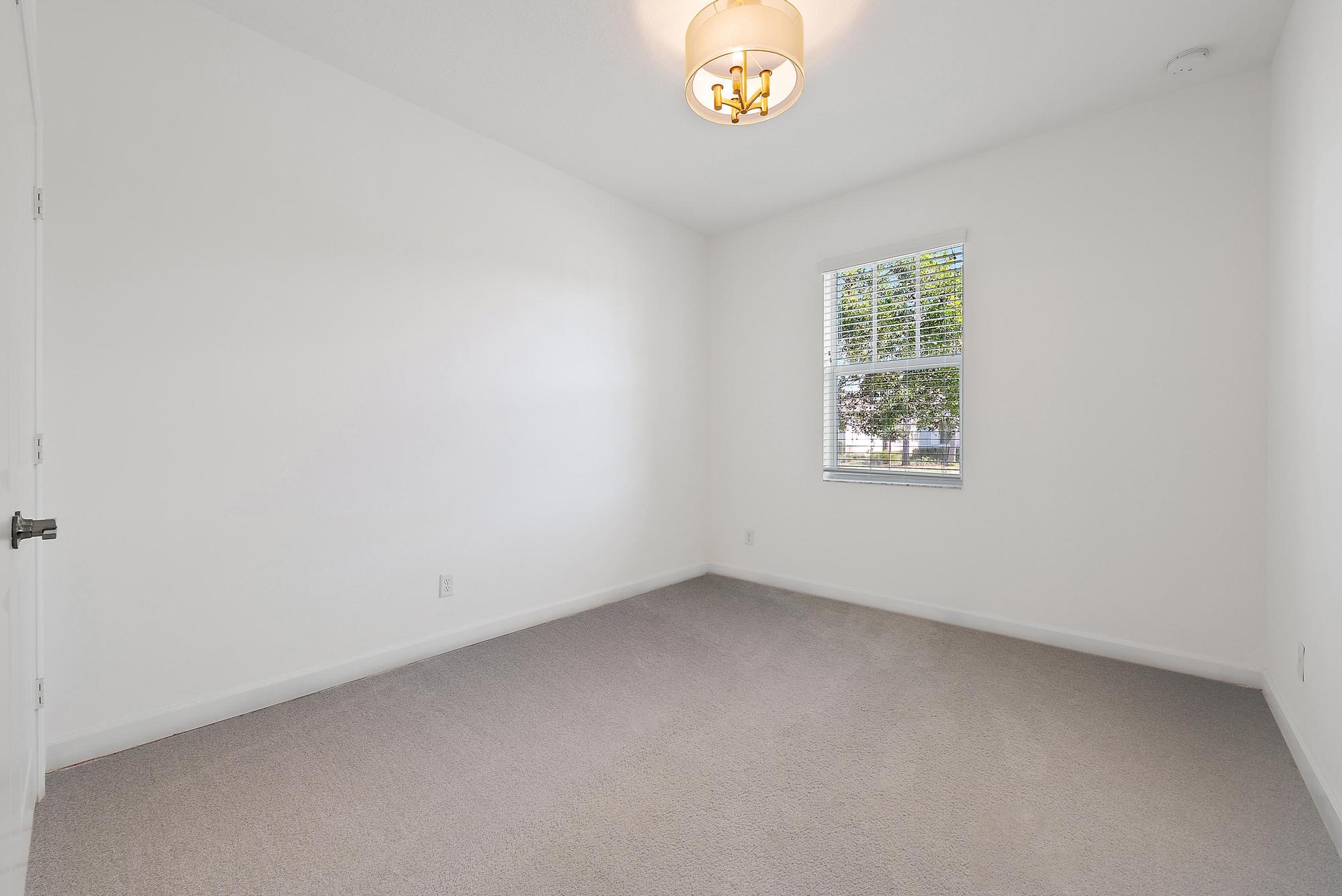 1283 Tangled Orch Trace Loxahatchee, FL 33470 - Photo 17 of 21 an empty room with a window