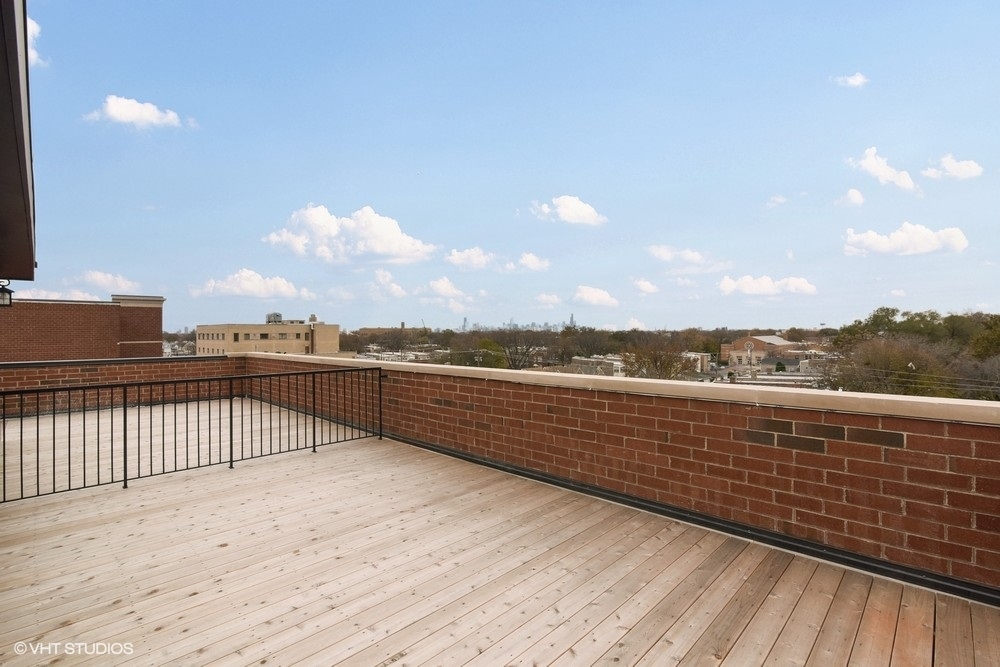 3326 West Irving Park Road, Unit 3W Chicago, IL 60618 - Photo 15 of 15 a view of terrace with city view