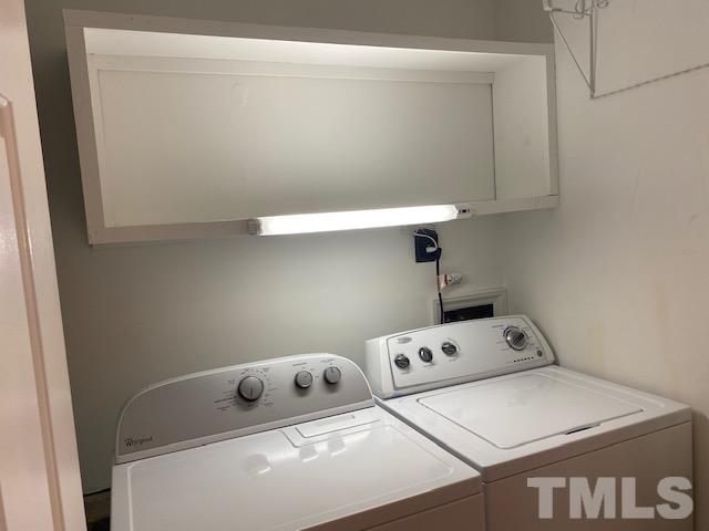 6412 Meadow View Drive Raleigh, NC 27609 - Photo 12 of 13 a utility room with dryer and washer