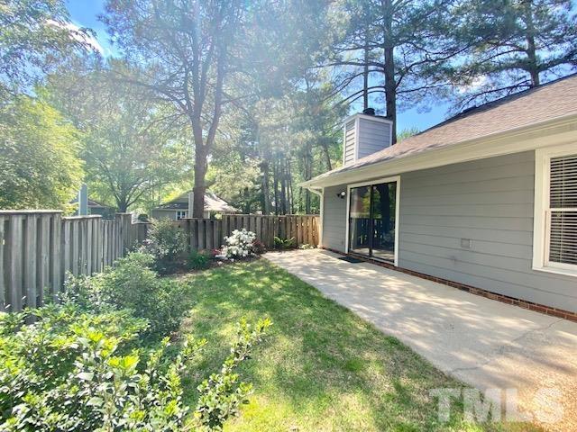 6412 Meadow View Drive Raleigh, NC 27609 - Photo 9 of 13 a view of a house with backyard and sitting area