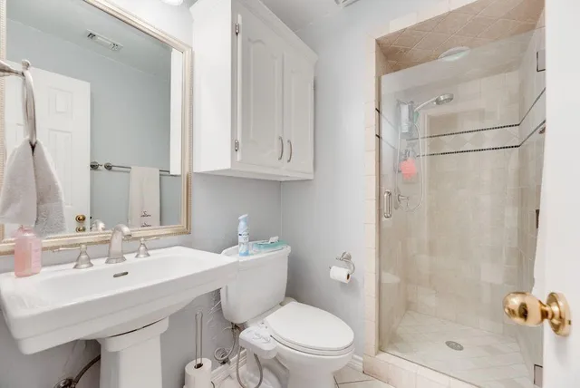 a view of a house with swimming pool and sitting area